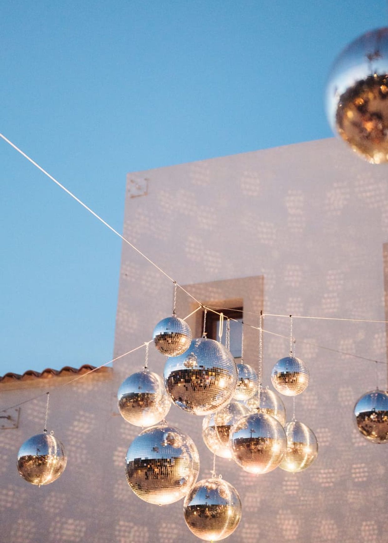 disco balls installation for ibiza wedding