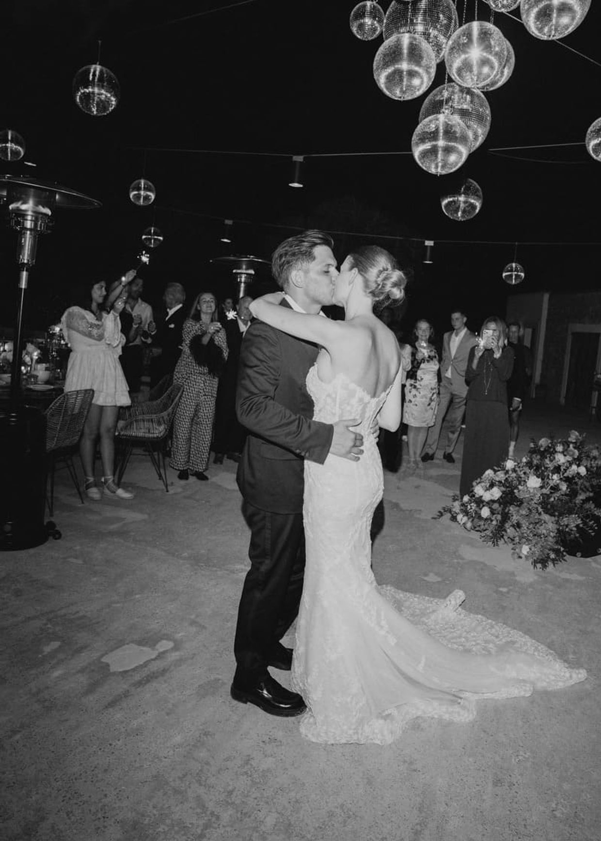 wedding couple in ibiza dancing with a disco balls decoration